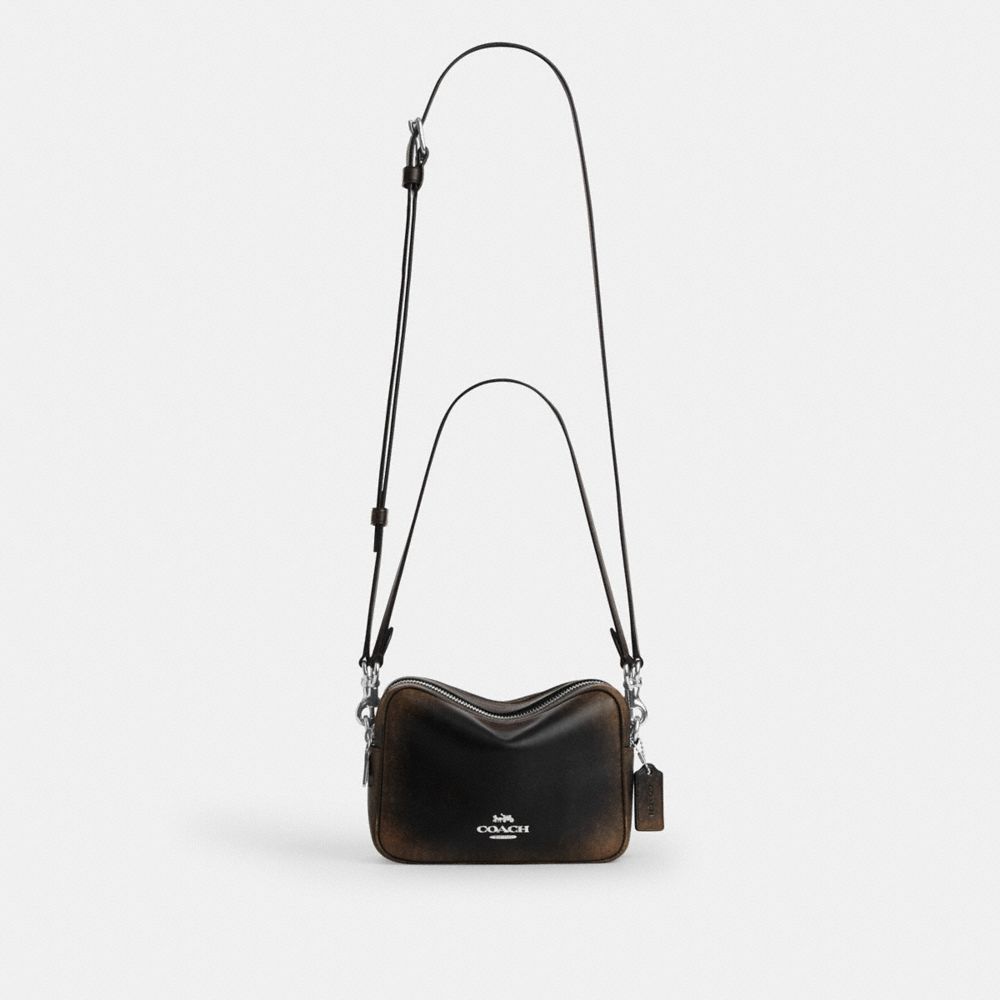 MINI CAREY CROSSBODY BAG IN LOVED LEATHER