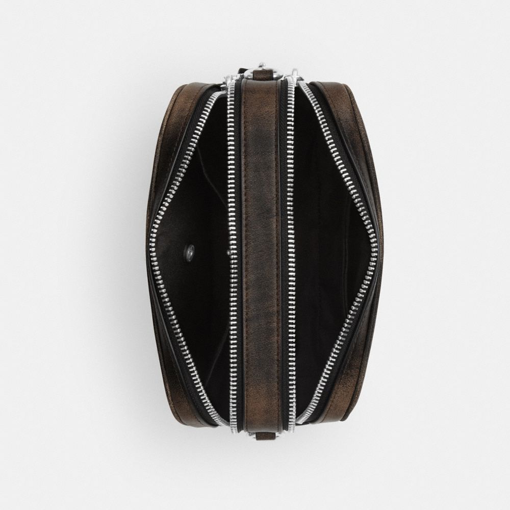 MINI CAREY CROSSBODY BAG IN LOVED LEATHER