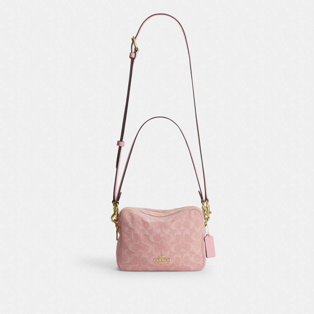 CAREY CROSSBODY BAG IN SIGNATURE DENIM