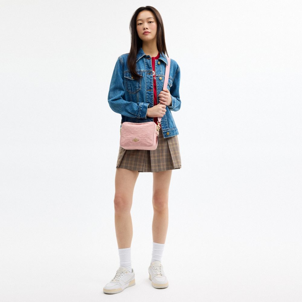 CAREY CROSSBODY BAG IN SIGNATURE DENIM