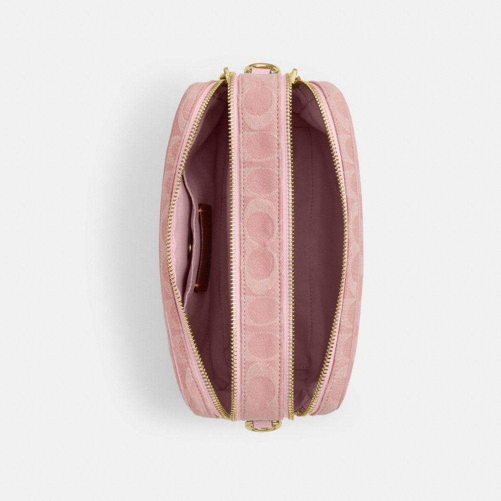CAREY CROSSBODY BAG IN SIGNATURE DENIM