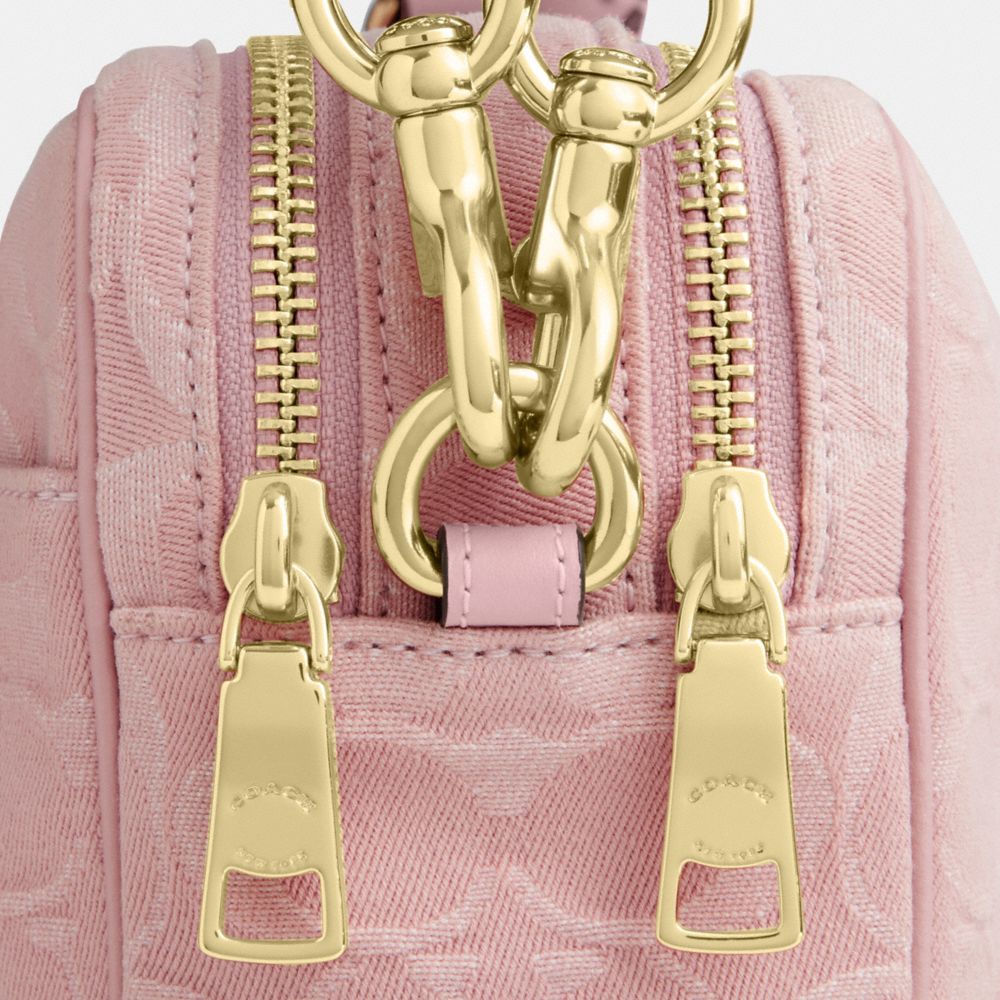 CAREY CROSSBODY BAG IN SIGNATURE DENIM