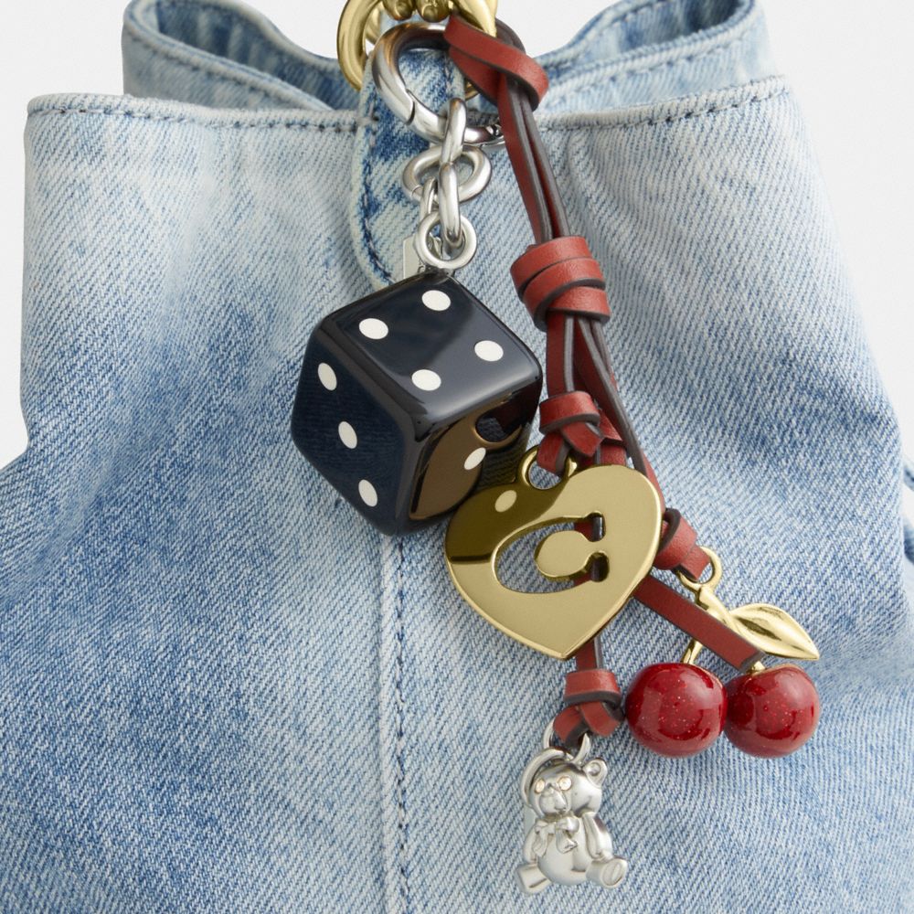 ROWAN BUCKET BAG IN LOVED DENIM WITH CHARMS