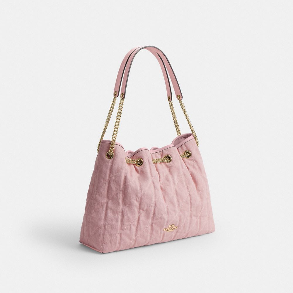 EVELYN SHOULDER BAG IN LOVED DENIM WITH QUILTING AND CHARM