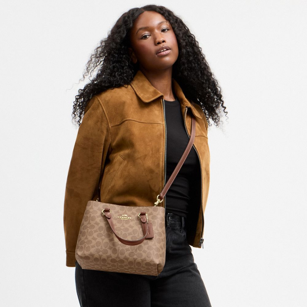 STATION CARRYALL BAG IN SIGNATURE CANVAS