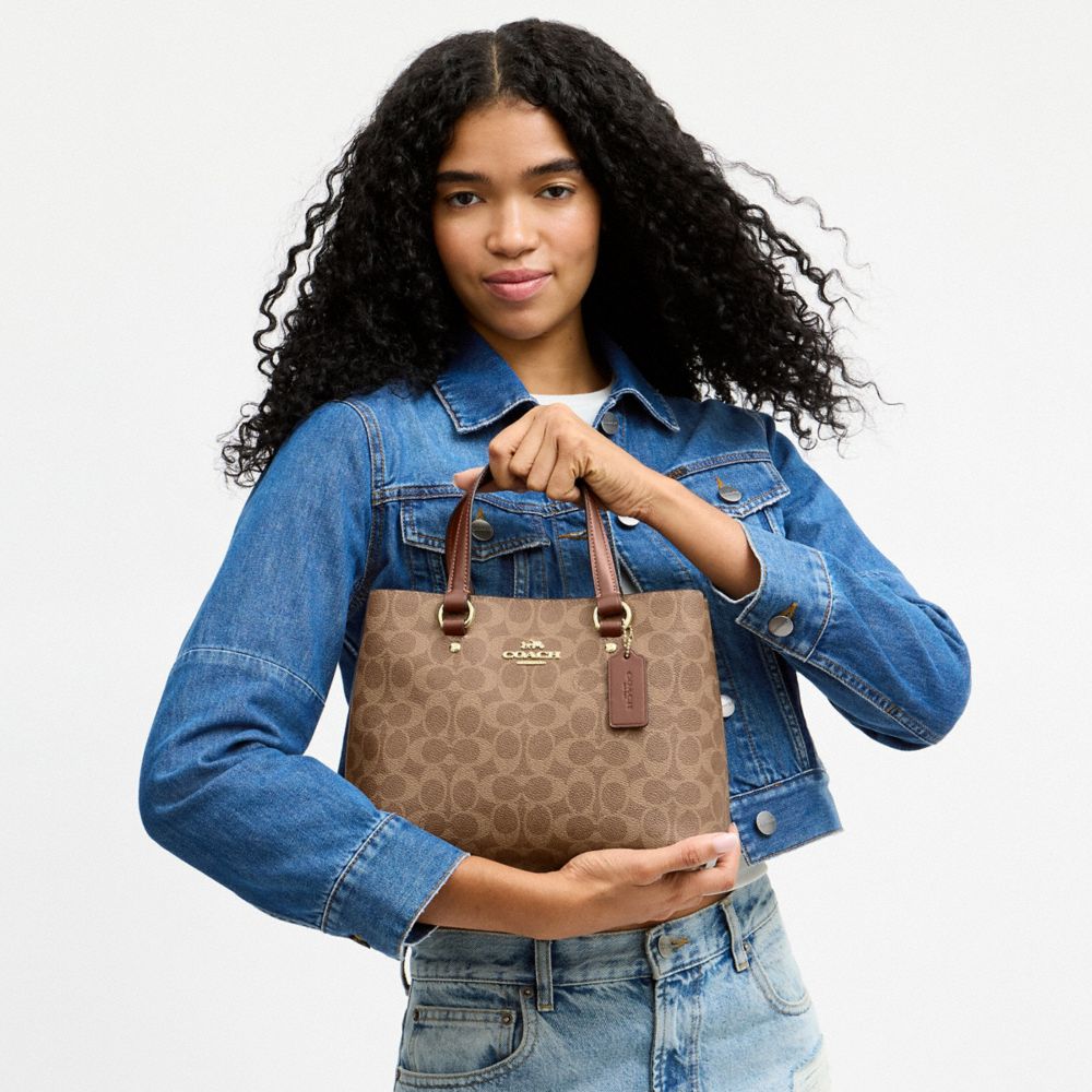 STATION CARRYALL BAG IN SIGNATURE CANVAS