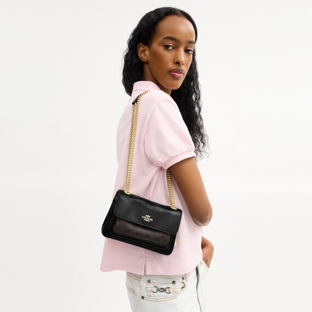 ELODIE CROSSBODY BAG 18 IN SIGNATURE CANVAS