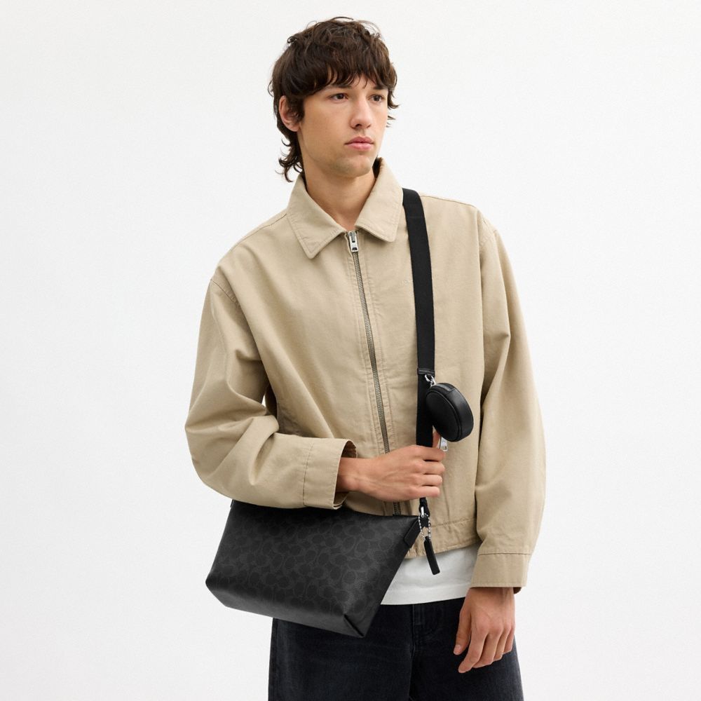 SMALL FINN CROSSBODY BAG WITH POUCH IN SIGNATURE CANVAS