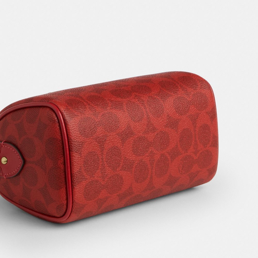 MINI ROWAN CROSSBODY BAG IN SIGNATURE CANVAS