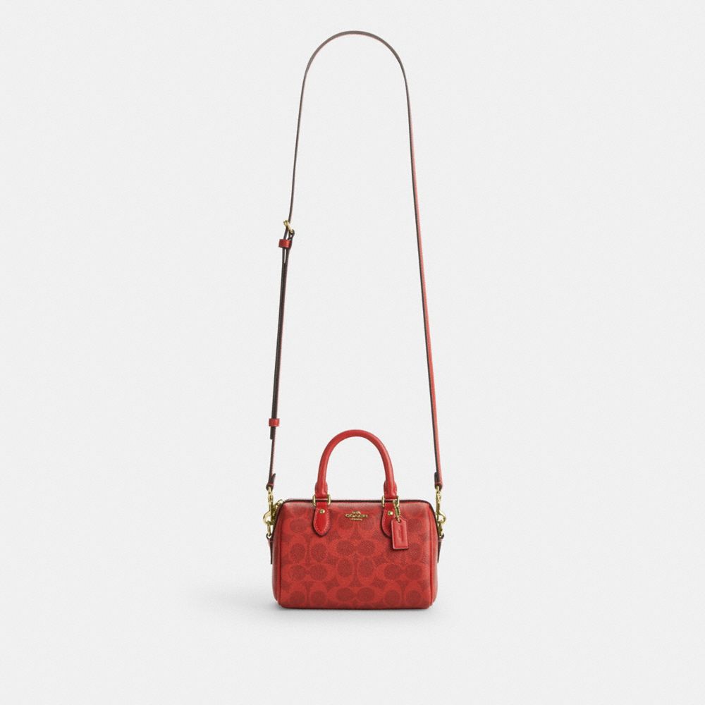 MINI ROWAN CROSSBODY BAG IN SIGNATURE CANVAS