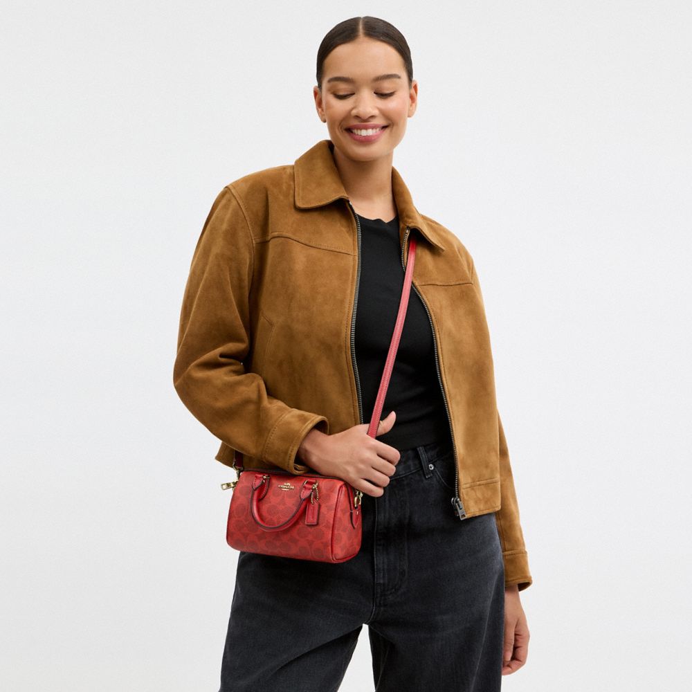 MINI ROWAN CROSSBODY BAG IN SIGNATURE CANVAS