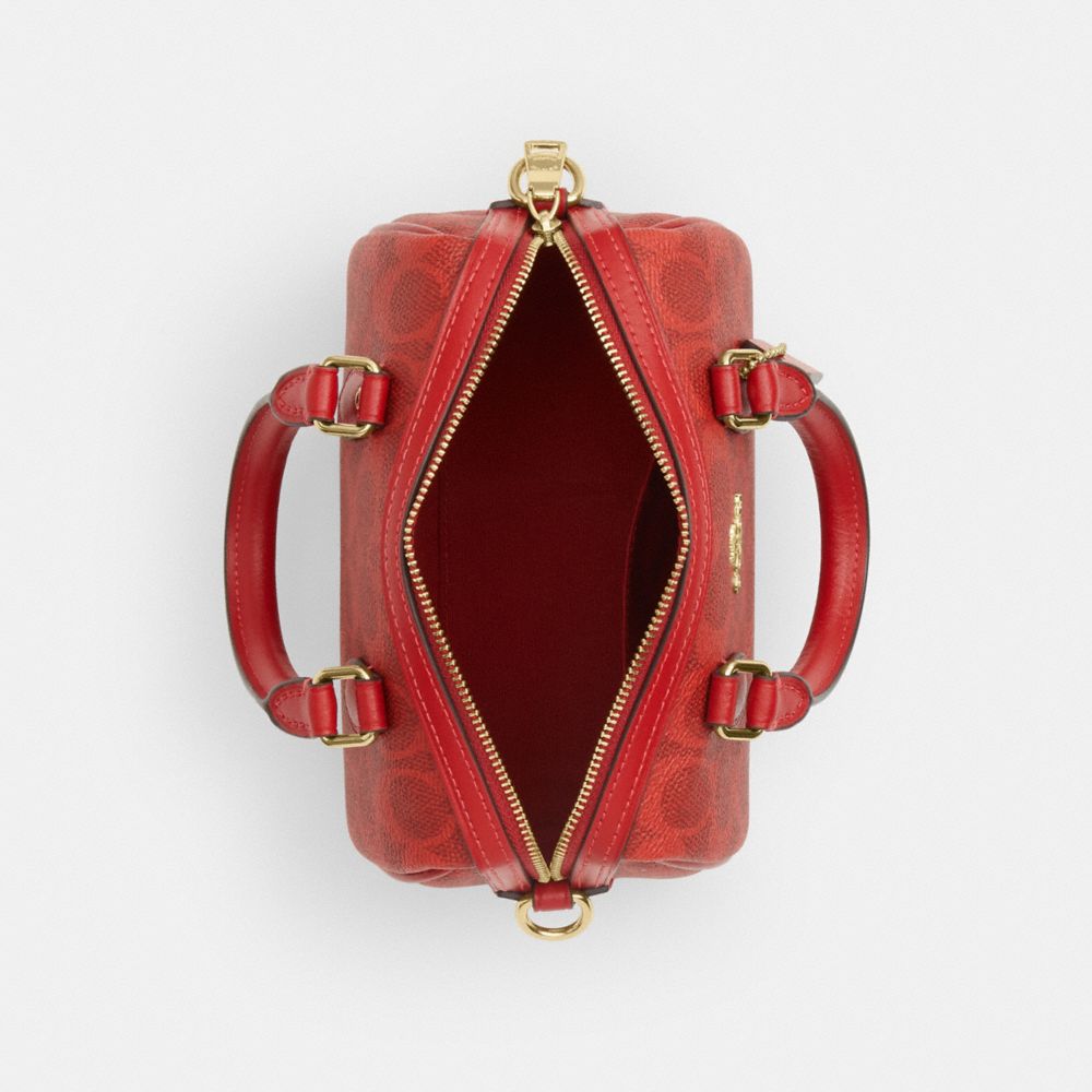 MINI ROWAN CROSSBODY BAG IN SIGNATURE CANVAS