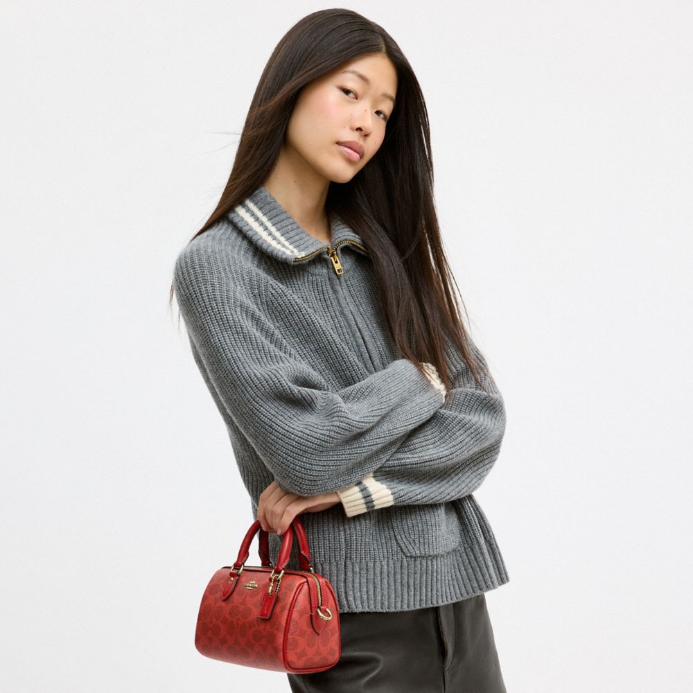 MINI ROWAN CROSSBODY BAG IN SIGNATURE CANVAS