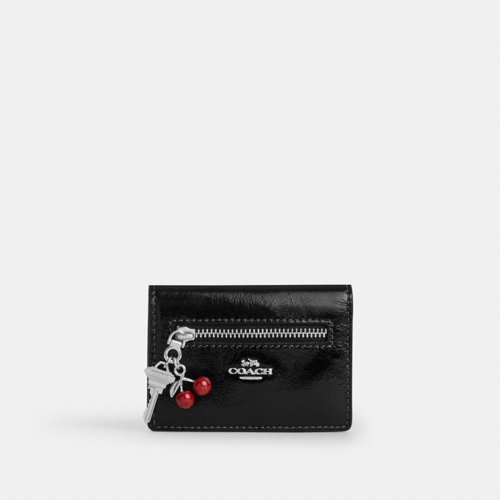 CARD CASE WITH CHARMS