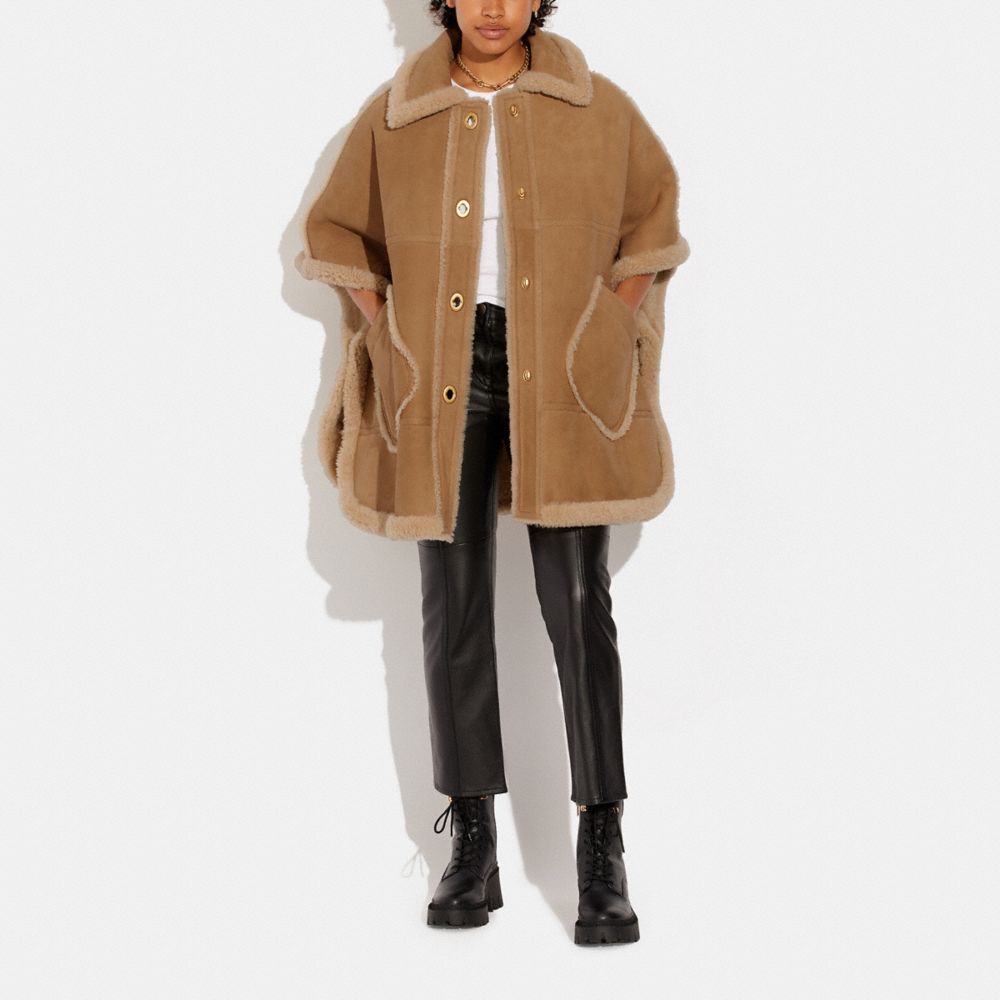 shearling poncho cape