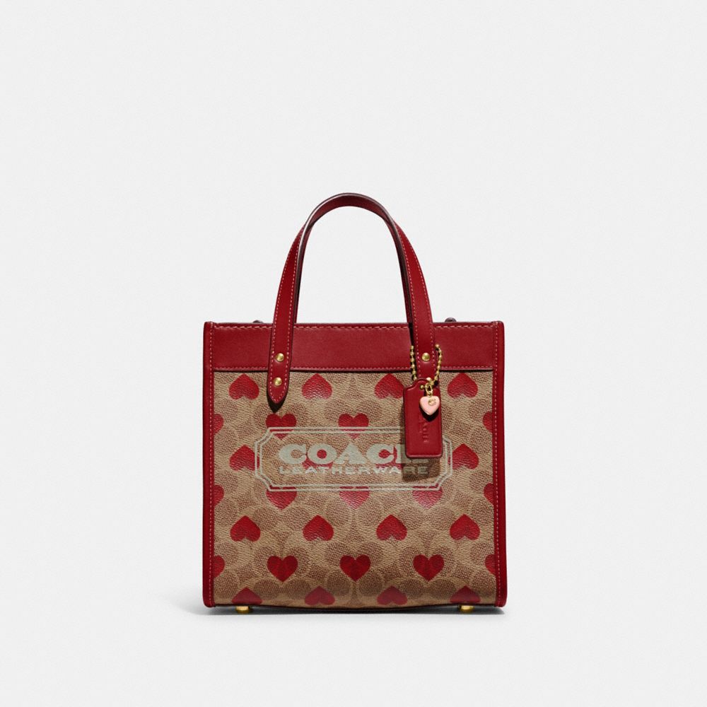 COACH CF127 Field Tote 22 In Signature Canvas With Heart Print BRASS/TAN RED APPLE