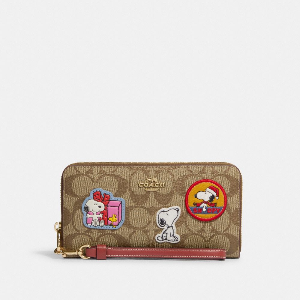 COACH CF218 Coach X Peanuts Long Zip Around Wallet In Signature Canvas With Patches GOLD/KHAKI/REDWOOD MULTI