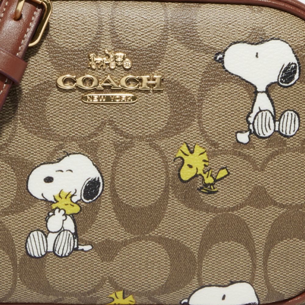 COACH X PEANUTS MINI JAMIE CAMERA BAG IN SIGNATURE CANVAS WITH SNOOPY WOODSTOCK PRINT