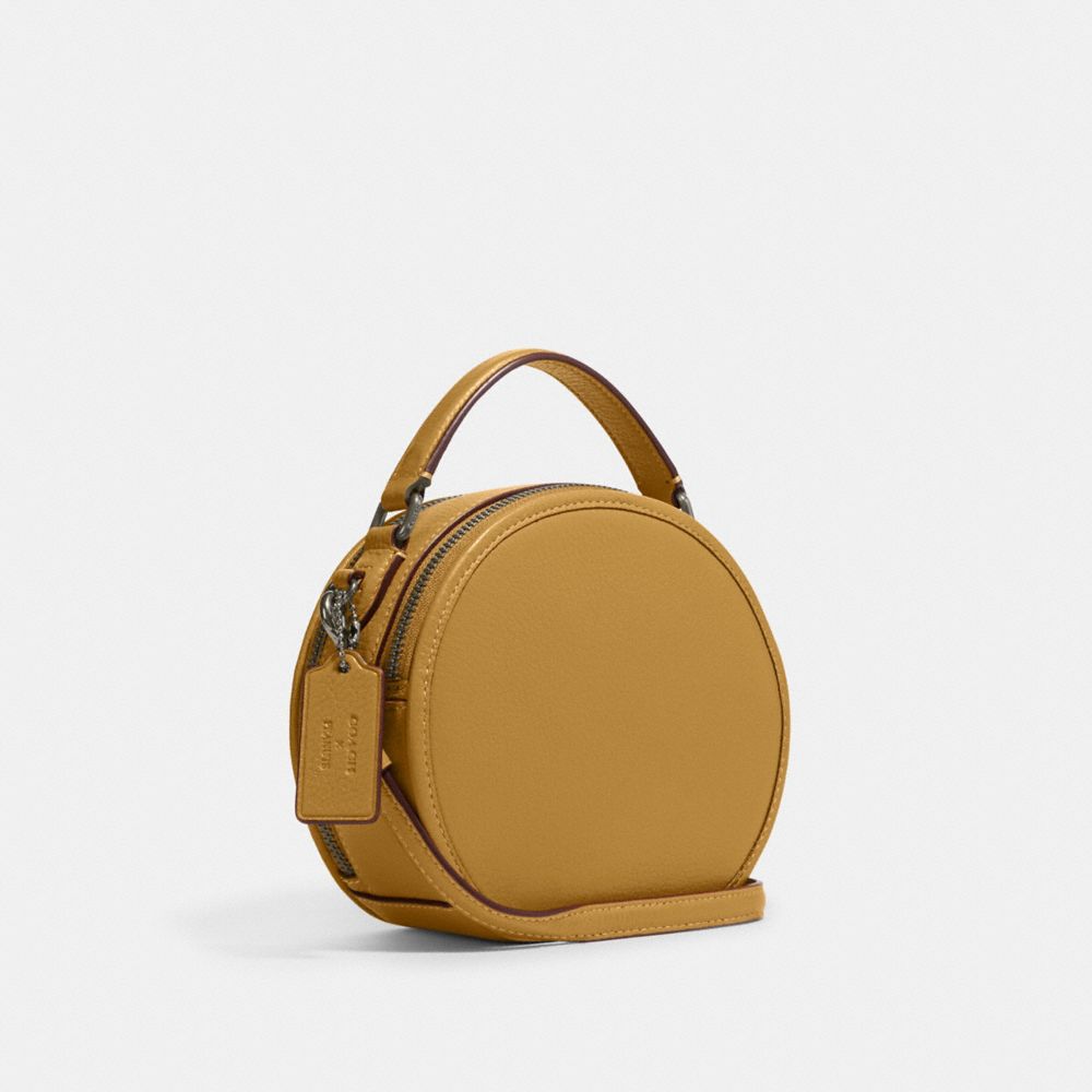 COACH X PEANUTS CANTEEN CROSSBODY WITH SNOOPY PRESENT MOTIF