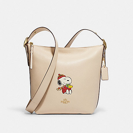 COACH CF292 Coach X Peanuts Val Duffle With Snoopy Cuddle Motif Gold/Ivory-Multi