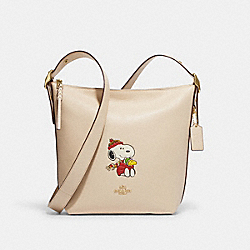 COACH CF292 Coach X Peanuts Val Duffle With Snoopy Cuddle Motif GOLD/IVORY MULTI