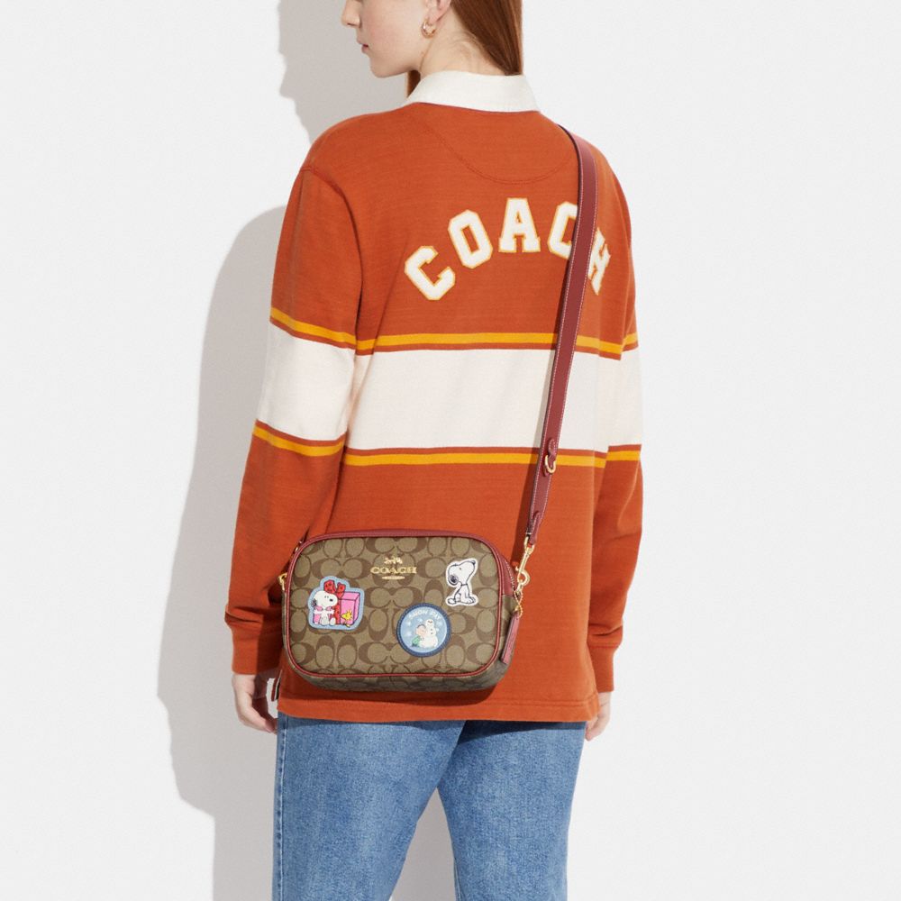 COACH X PEANUTS JAMIE CAMERA BAG IN SIGNATURE CANVAS WITH PATCHES