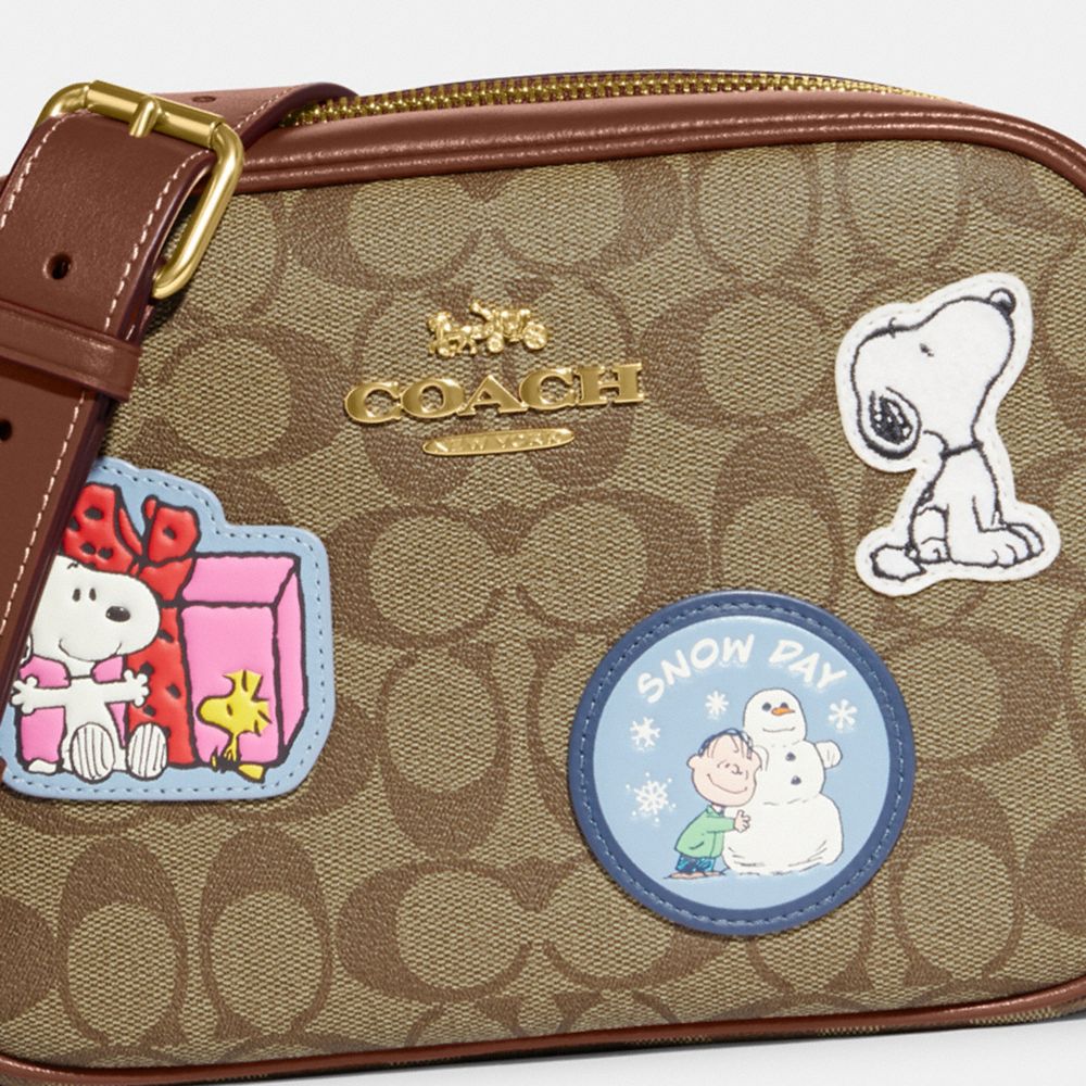 COACH X PEANUTS JAMIE CAMERA BAG IN SIGNATURE CANVAS WITH PATCHES