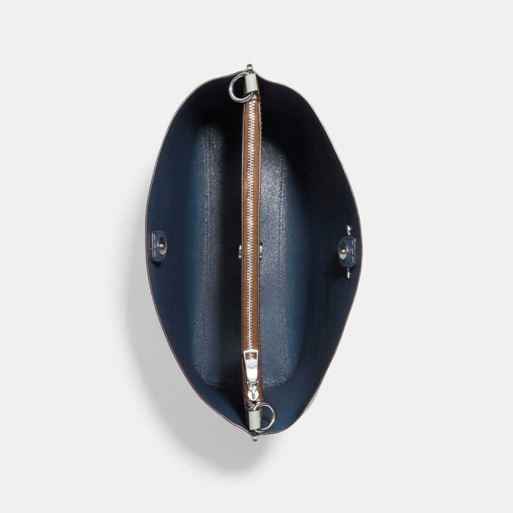 MOLLIE BUCKET BAG WITH SIGNATURE CANVAS INTERIOR