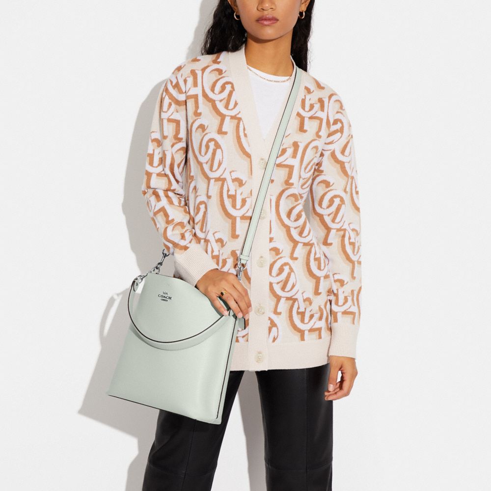 MOLLIE BUCKET BAG WITH SIGNATURE CANVAS INTERIOR