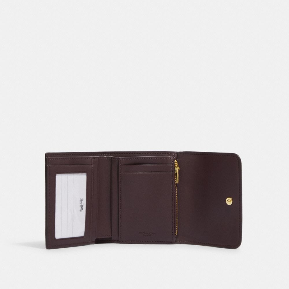 SMALL TRIFOLD WALLET IN COLORBLOCK SIGNATURE CANVAS