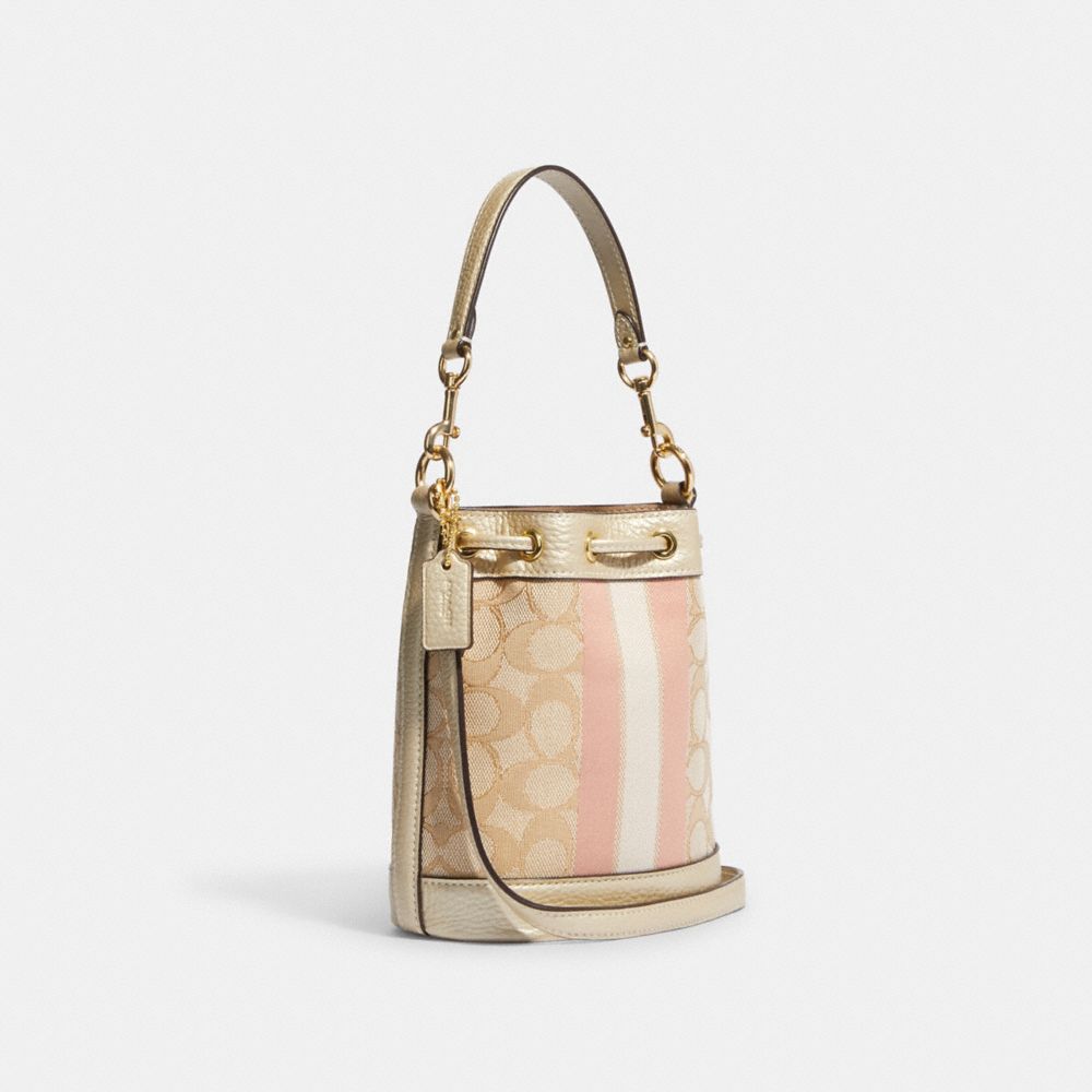 MINI DEMPSEY BUCKET BAG IN SIGNATURE JACQUARD WITH STRIPE AND COACH PATCH