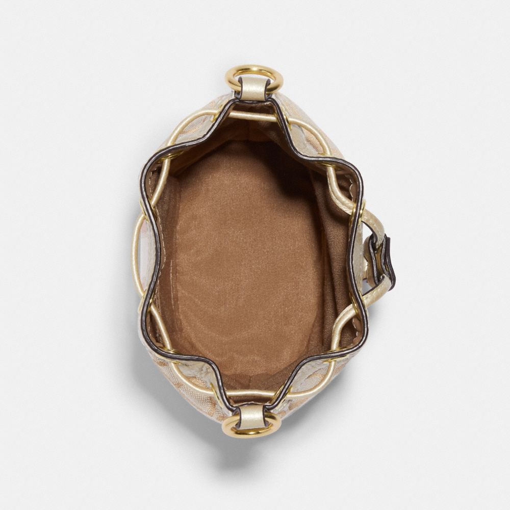 MINI DEMPSEY BUCKET BAG IN SIGNATURE JACQUARD WITH STRIPE AND COACH PATCH