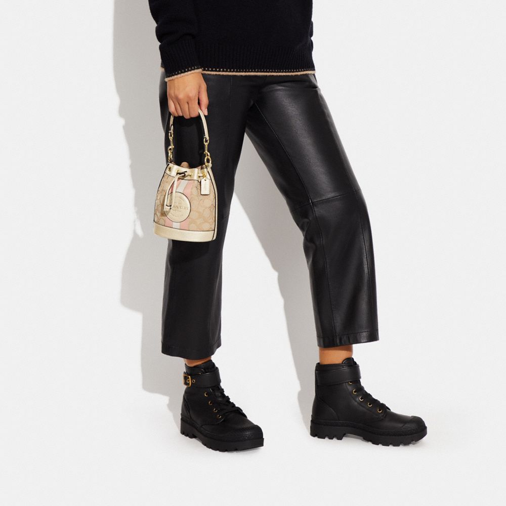 MINI DEMPSEY BUCKET BAG IN SIGNATURE JACQUARD WITH STRIPE AND COACH PATCH