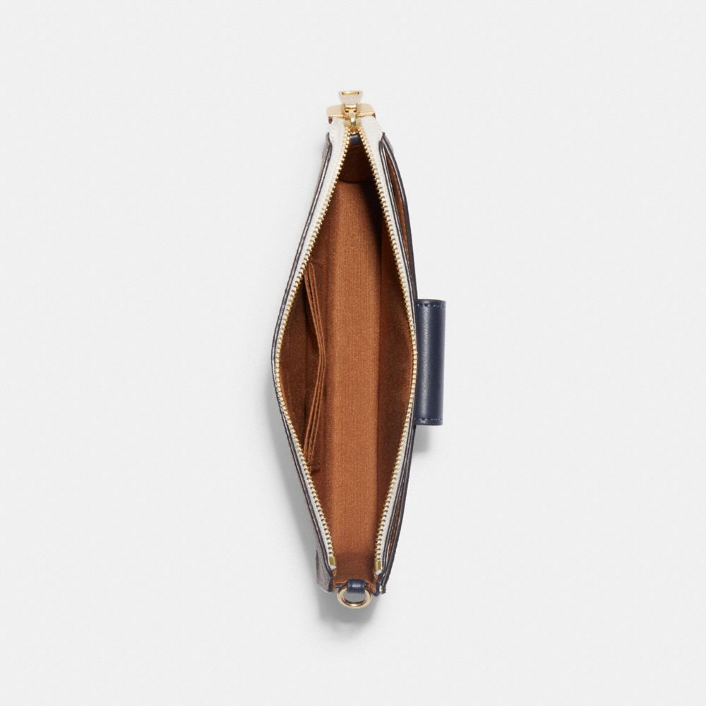 POPPY CROSSBODY IN COLORBLOCK SIGNATURE CANVAS