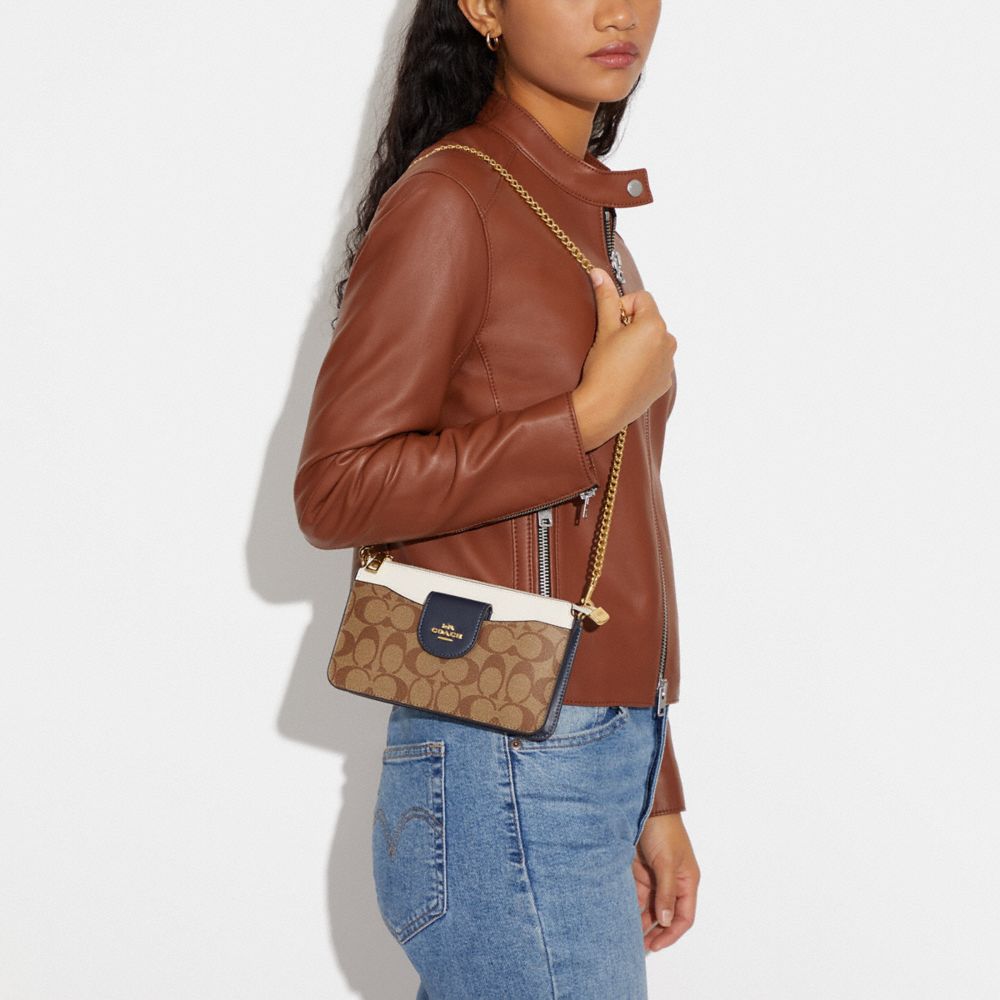 POPPY CROSSBODY IN COLORBLOCK SIGNATURE CANVAS