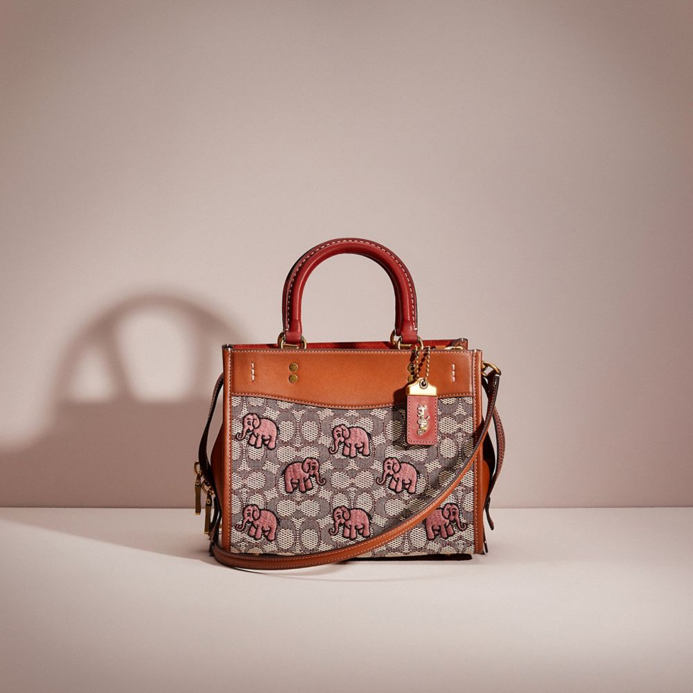 CF770 - Restored Rogue 25 In Signature Textile Jacquard With Embroidered Elephant Brass/Cocoa Burnished Amb
