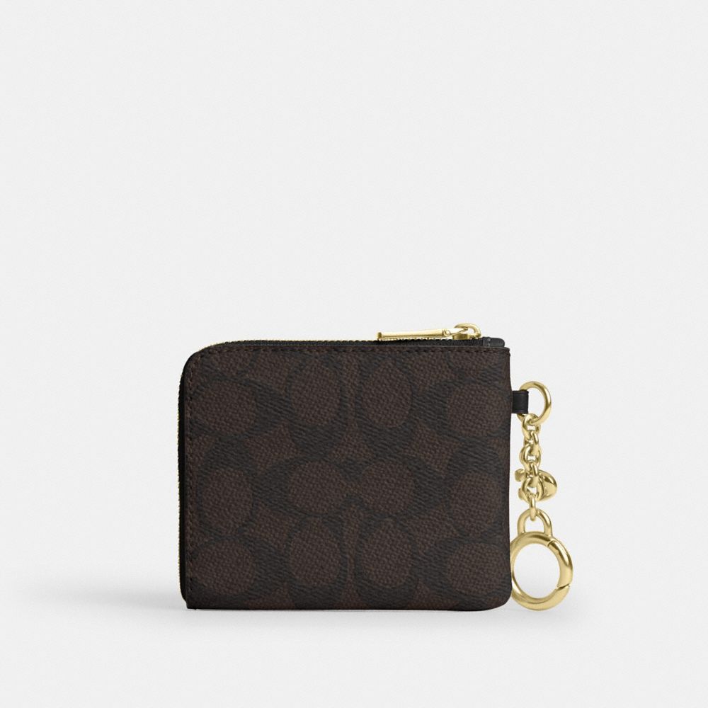 SMALL CORNER ZIP WALLET IN SIGNATURE CANVAS