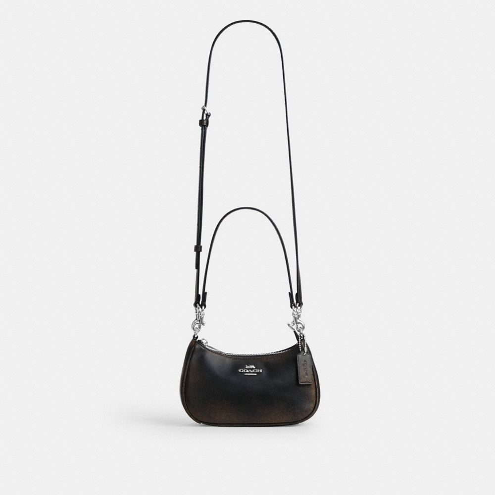 TERI MINI CROSSBODY BAG IN LOVED LEATHER