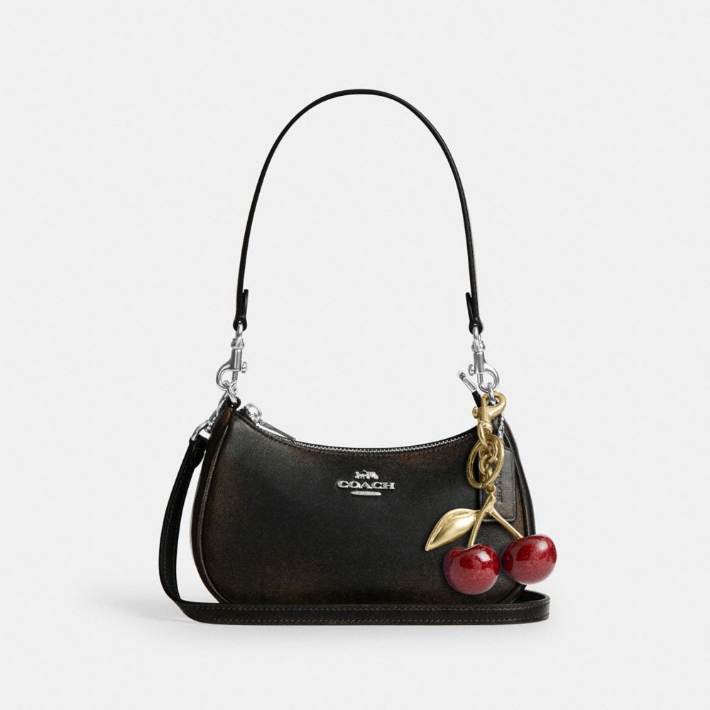 TERI MINI CROSSBODY BAG IN LOVED LEATHER