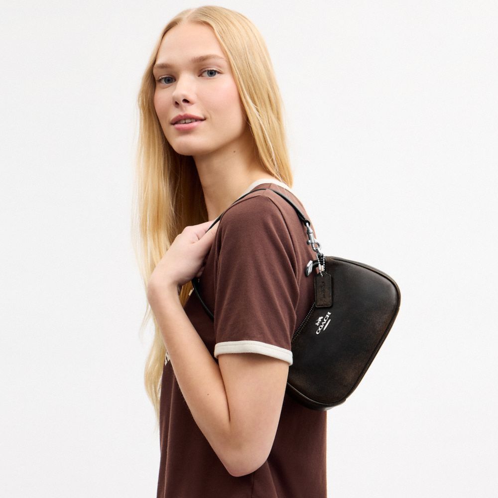 TERI MINI CROSSBODY BAG IN LOVED LEATHER