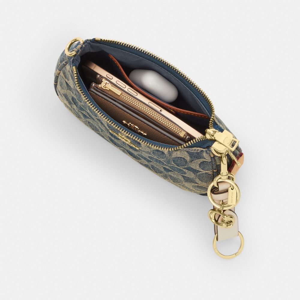 TERI MINI CROSSBODY BAG IN SIGNATURE REGENERATIVE COTTON DENIM