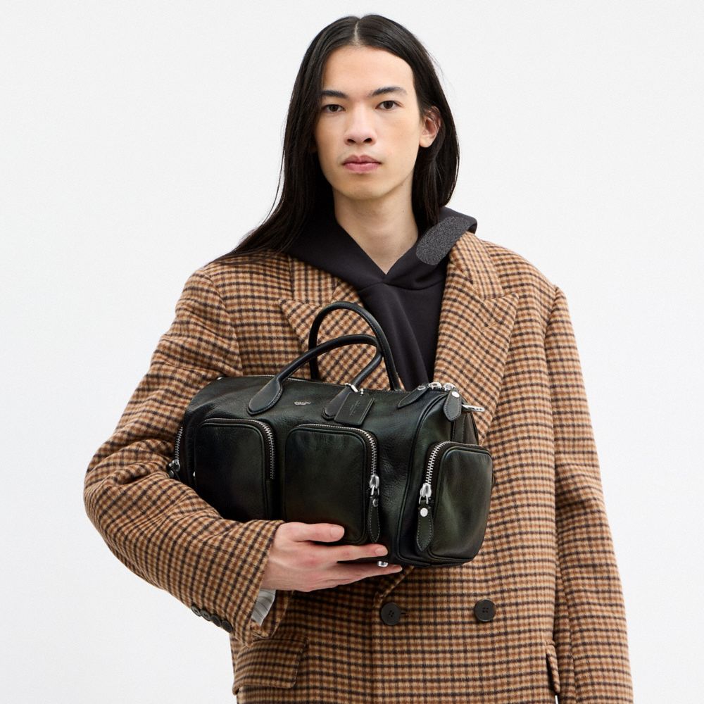 COMPASS BAG 35 WITH POCKETS