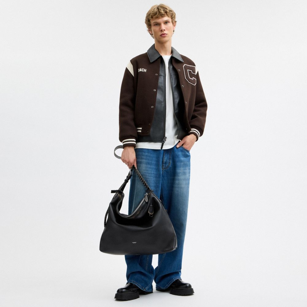MOTT MESSENGER BAG IN LOVED LEATHER WITH STUDS