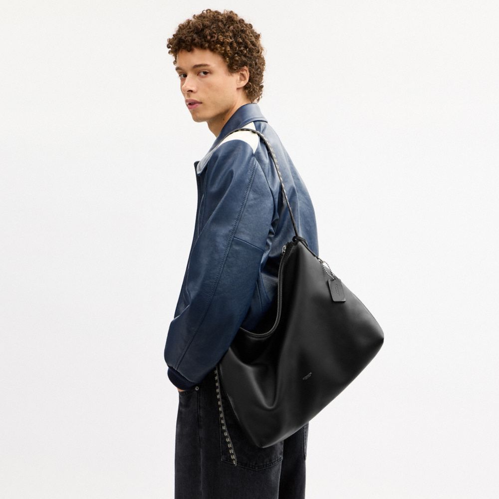 MOTT MESSENGER BAG 38 IN LOVED LEATHER WITH STUDS