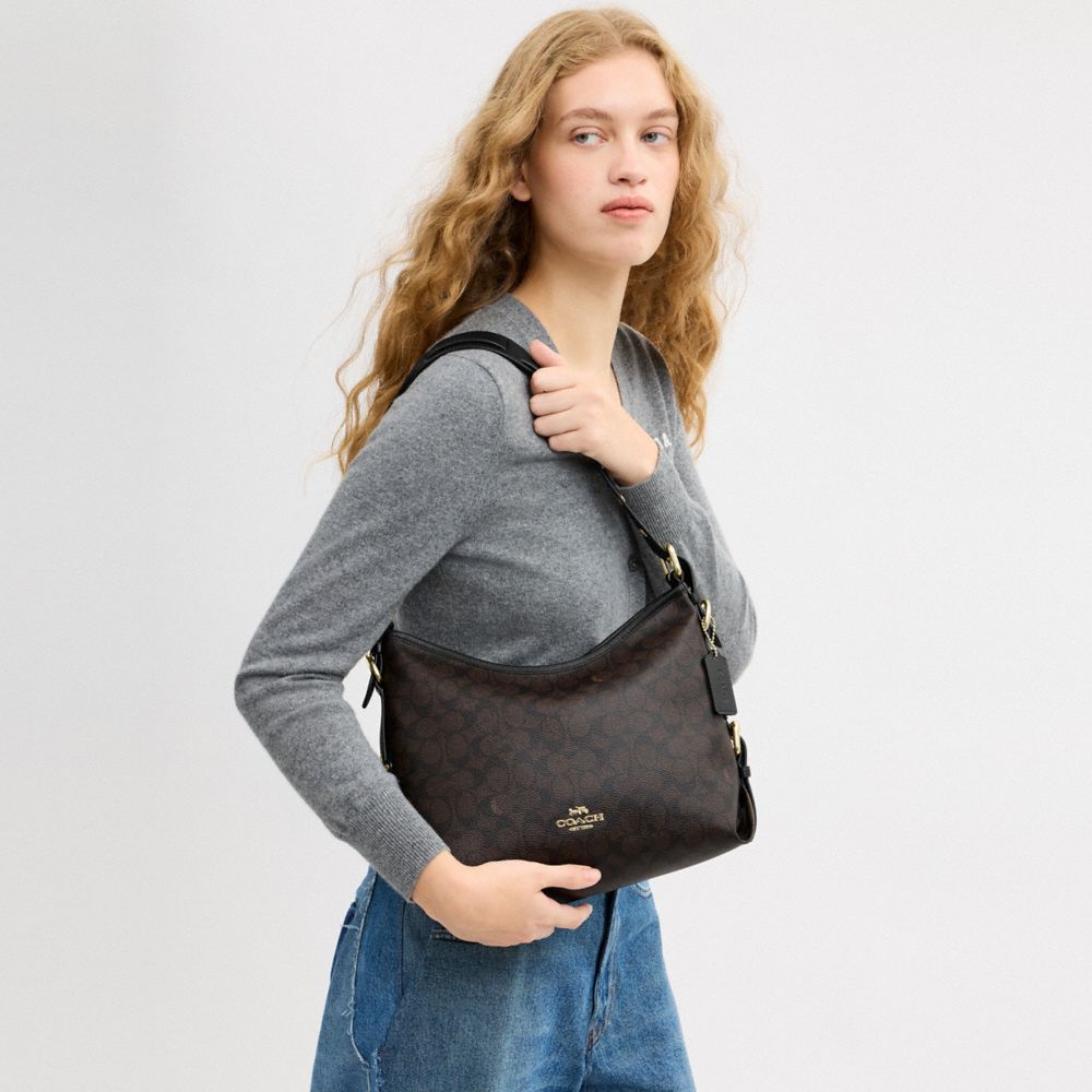 LAUREL SHOULDER BAG WITH BUCKLES IN SIGNATURE CANVAS