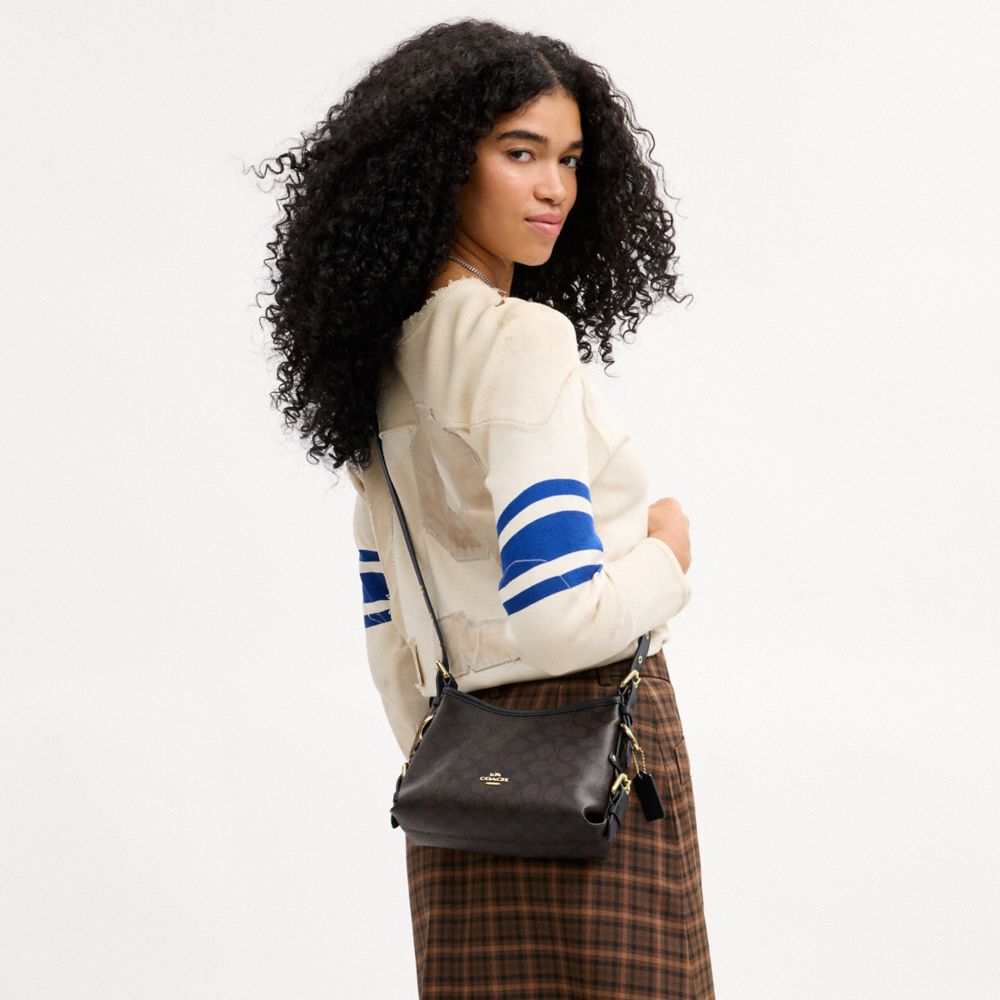 LAUREL SHOULDER BAG 22 WITH BUCKLES IN SIGNATURE CANVAS