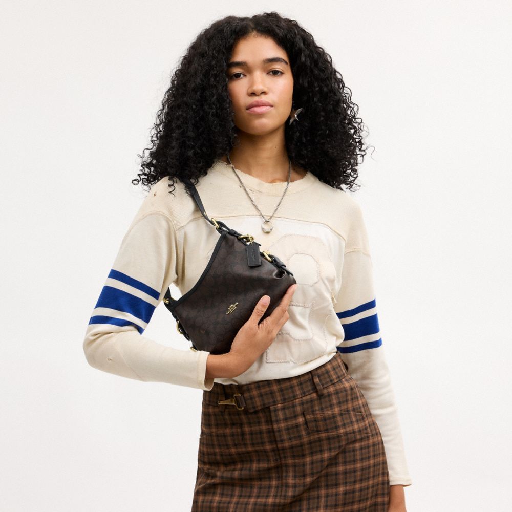 LAUREL SHOULDER BAG 22 WITH BUCKLES IN SIGNATURE CANVAS
