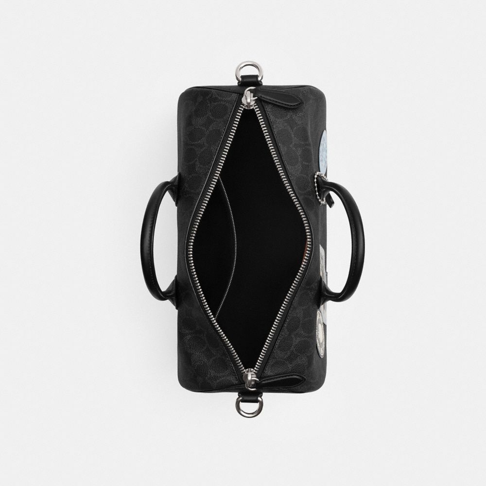 COMPASS BAG 35 WITH STICKERS IN SIGNATURE UPCRAFTEDLEATHER