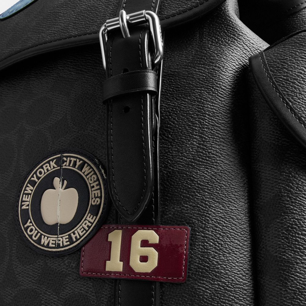 HITCH BACKPACK WITH STICKERS IN SIGNATURE UPCRAFTEDLEATHER