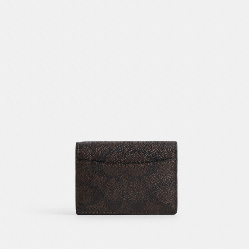CARD CASE WITH CHARMS IN SIGNATURE CANVAS